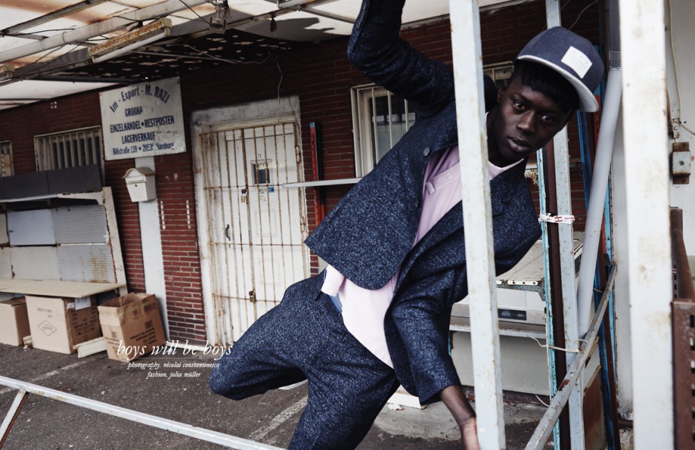 Alpha Dia @ Modelwerk wears Suit / COS Poloshirt / Topman Cap / Carhartt
