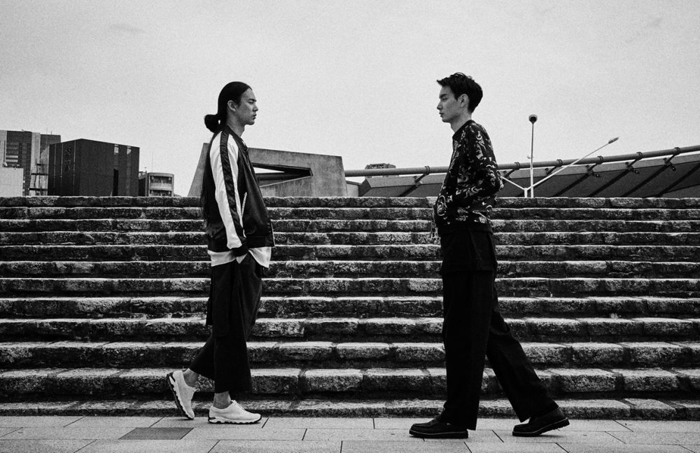 Ko wears Jacket / MR.GENTLEMAN  Knit / Almost Black  Trousers / ETHOSENS  Shoes / H?Katsukawa from Tokyo Shunya wears Jacket / CHRISTIAN DADA  T-Shirt / COMME des GARÇONS  Trousers / ETHOSENS  Shoes / H?Katsukawa from Tokyo